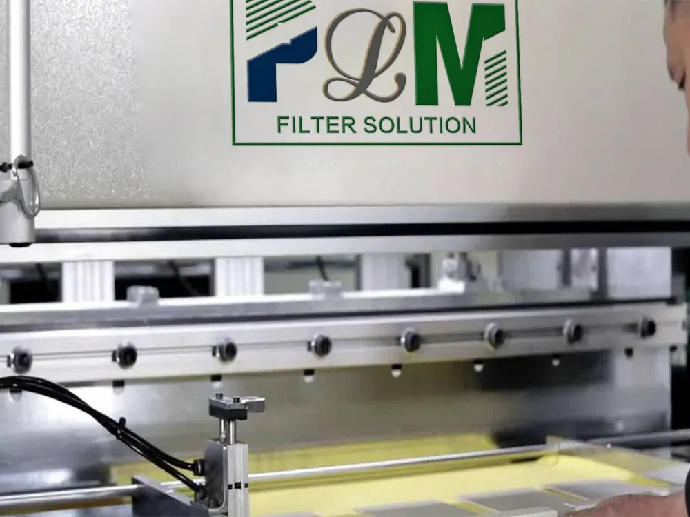 PLM pleating machine being inspected before shipping