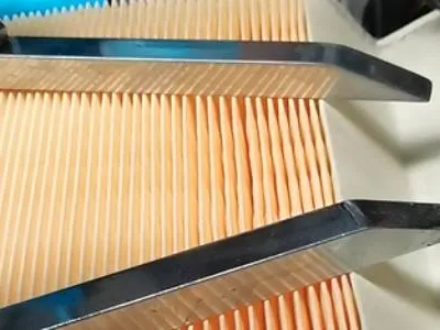 Oil filter paper being pleated